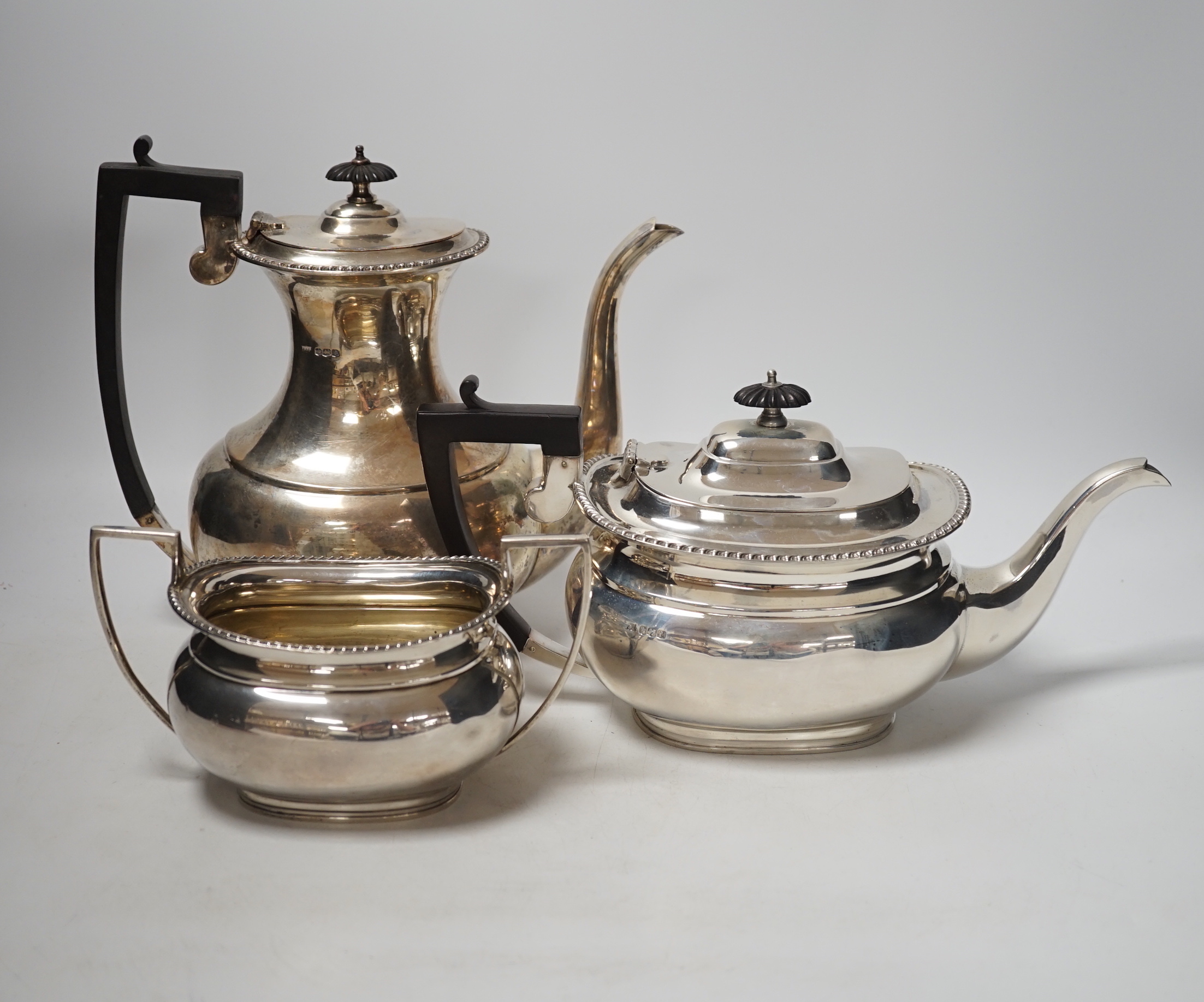 A George V silver coffee pot, teapot and sugar bowl, Fordham & Fordham, Sheffield, 1923. gross weight 59.8oz.